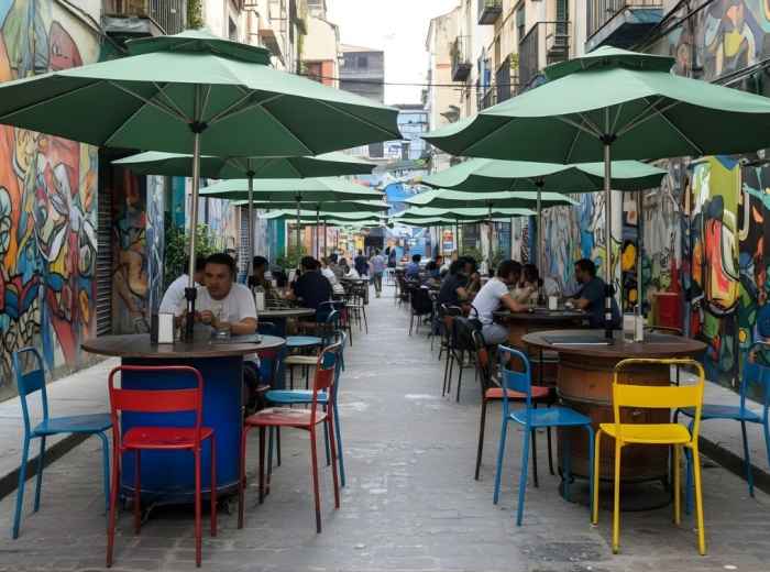 Colorful Haji Lane shophouses with street art and boutique storefronts