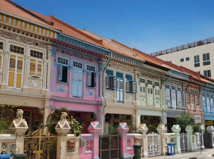 Peranakan shophouse facade with intricate hand-painted tiles and pastels