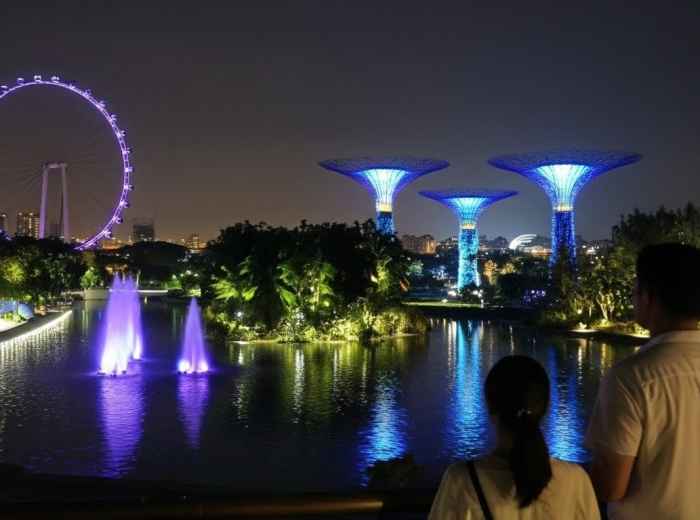 Illuminated lantern display at Gardens by the Bay with Super Tree backdrop