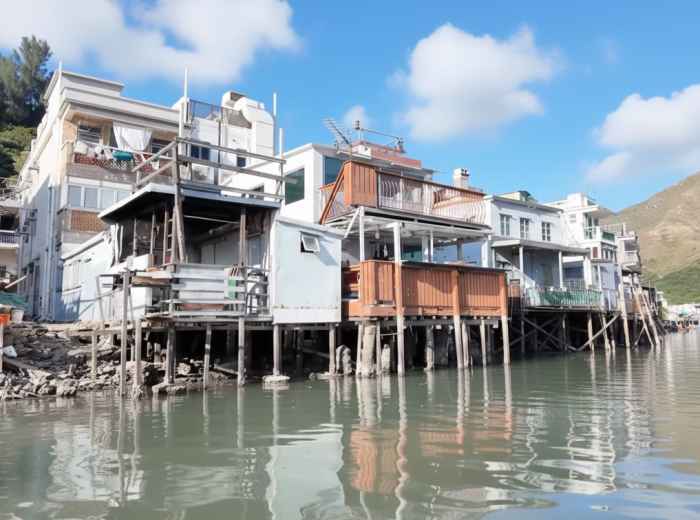 Tai O stilt houses over water with traditional wooden structures