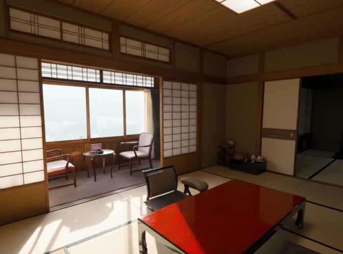 Traditional ryokan room with tatami mats, shoji screens, and seating area overlooking Hakone