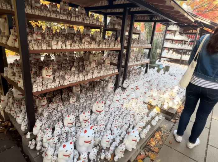 Maneki neko cat figurines at Gotokuji Temple in Setagaya, Tokyo, a quiet shrine known for beckoning cats and good fortune