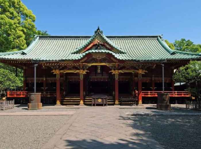 Main hall of Nezu Shrine in Tokyo, featuring traditional Shinto architecture in the quiet Nezu district