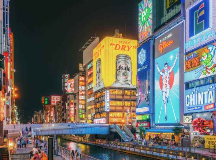 Dotonbori at night with illuminated signs reflecting in the canal, Osaka