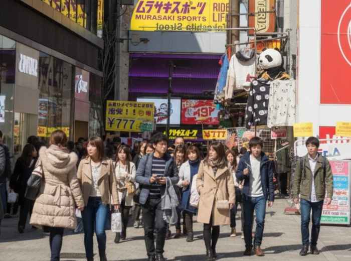 Takeshita Street square crowded with shoppers during peak hours with dense foot traffic, Tokyo