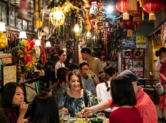 Ebisu Yokocho food alley with small vendor counters and casual dining atmosphere