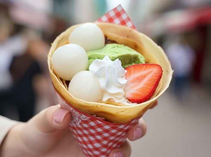 Kakigori shaved ice dessert with colorful toppings and syrup