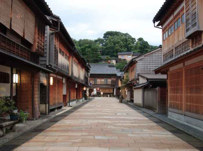 Early morning street in Higashi Chaya with wooden townhouses and empty lanes
