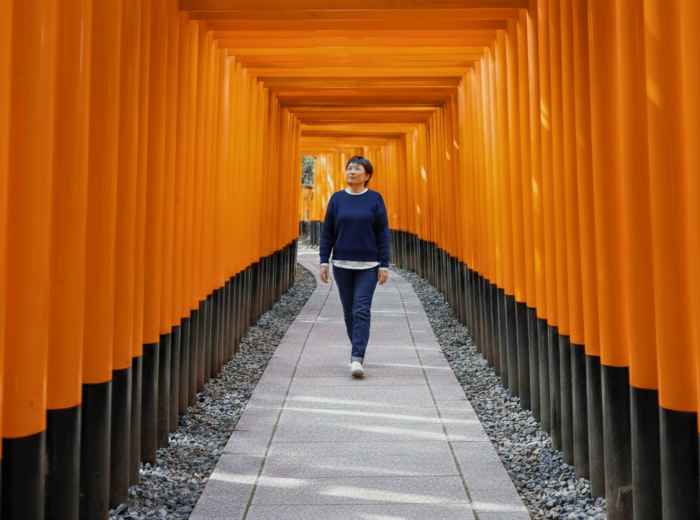 Walking under the torii gates at Fushimi Inari