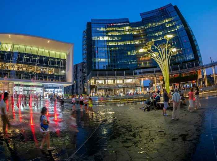 Piazza Gae Aulenti at dusk with Unicredit Tower lights