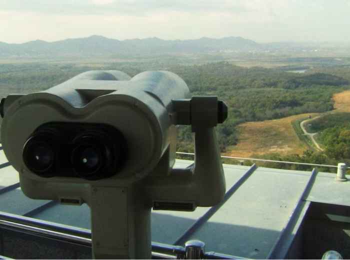 Binoculars at a DMZ observation deck overlooking the border landscape