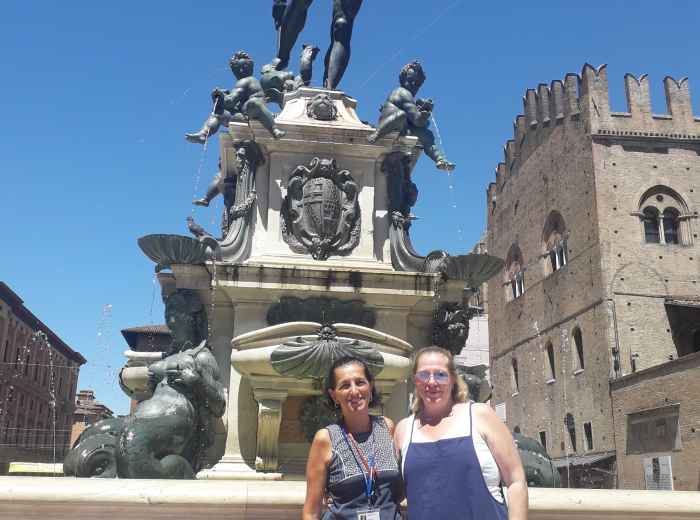 Enjoying Bologna's architecture with a guest.