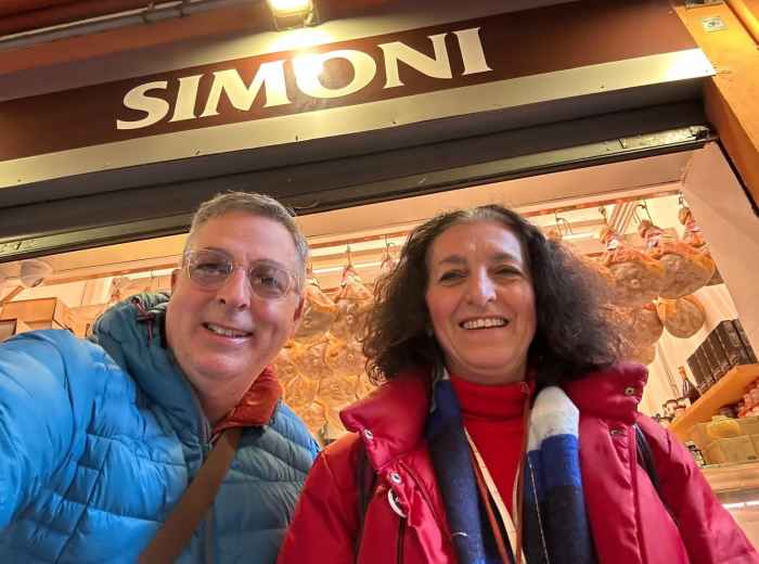 Posing with a happy guest during their visit.