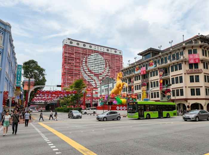 Busy street scene in Singapore's Chinatown district 