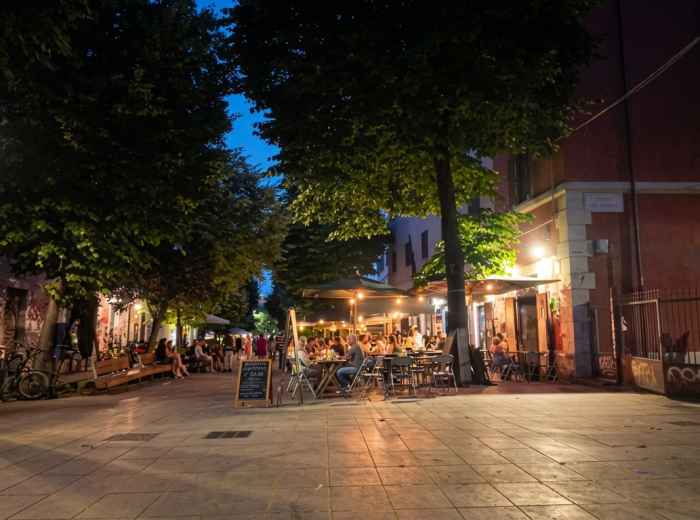 Evening café scene on Via del Pigneto in Rome 