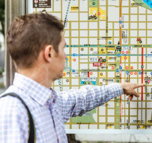 A couple working out their travel route