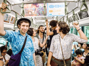 Travelers on a train from Kyoto station