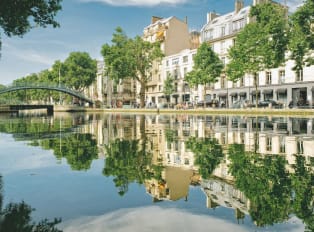 Observe Parisian life in all its vibrant glory.