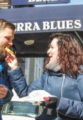 private guided tour nyc Tourists trying local food on a food tour of Greenwich Village