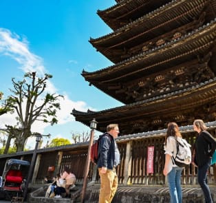 Tourists on a tour in Kyoto, Japan