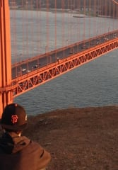 private guided tour nyc Tourist enjoying the beautiful view of Golden Gate Bridge at sunset in San Francisco