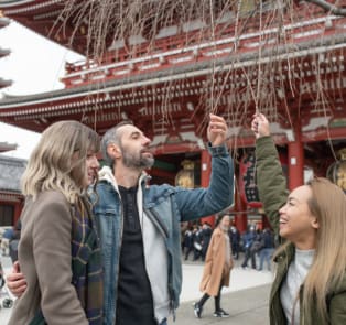 Private guide with travelers at Senso-Ji Temple, Japan