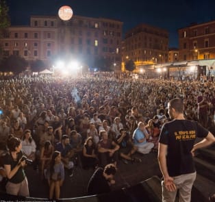 See a movie at an open air cinema