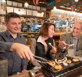 Tokyo's locals have fun with the travelers in the resta