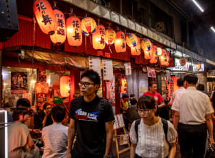 People walking in a alley in Tokyo