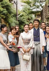 kobe beef tours Tourists exploring the alleyways of Japan with a local guide