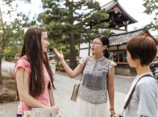 Travelers on a tour in Kyoto, Japan