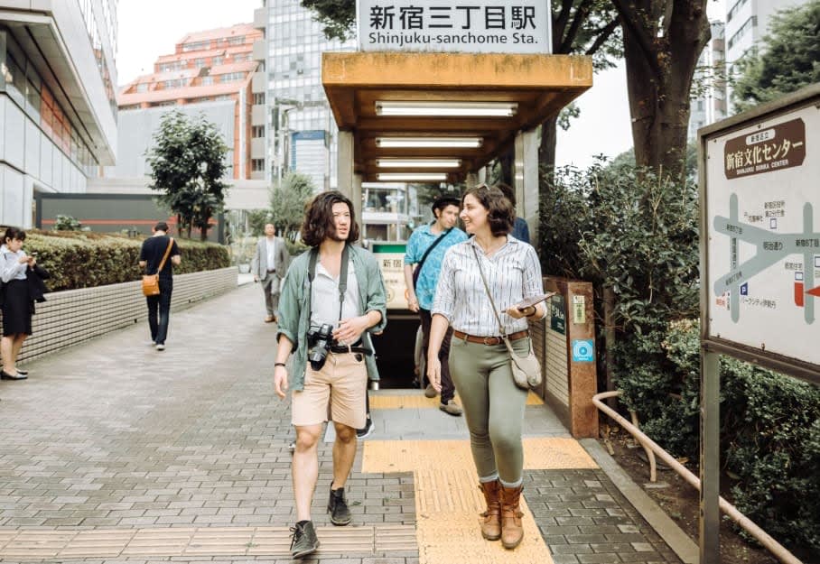 tourist talking with local