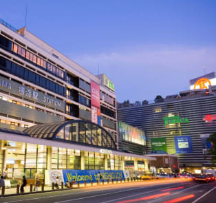 Yokohama Station lit up in the evening