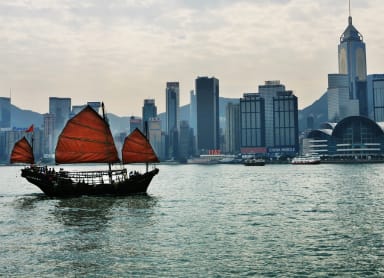 Ride aboard the Star Ferry and Tram