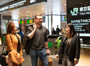 Tourists embarking on a tour in Tokyo, Japan