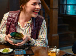 Traveler enjoying a mulit course meal on a Kyoto food t