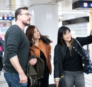 Tourists embarking on tours in Tokyo, Japan