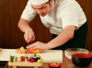Sushi chef preparing sushi in Tokyo, Japan