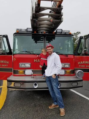 My son and I infront of a firetruck