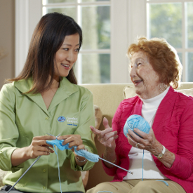 caregiver-knitting-with-senior