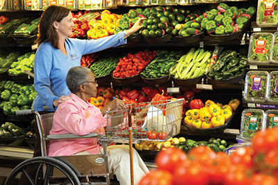 One of our Comfort Keepers caregivers helping elders with post-hospital care.