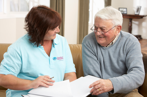 Senior and client care coordinator reviewing available home care services in Denver