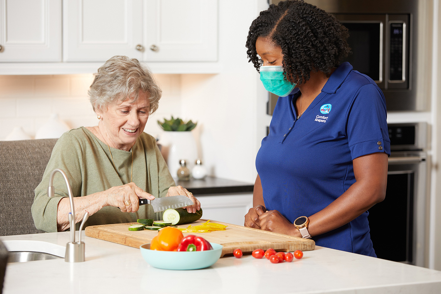 helping cook wearing a mask