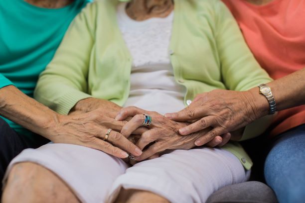 Comforting senior as part of end of life care. 