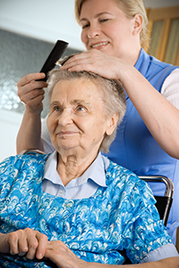 Caregiver assisting senior with grooming in Rutherford NJ