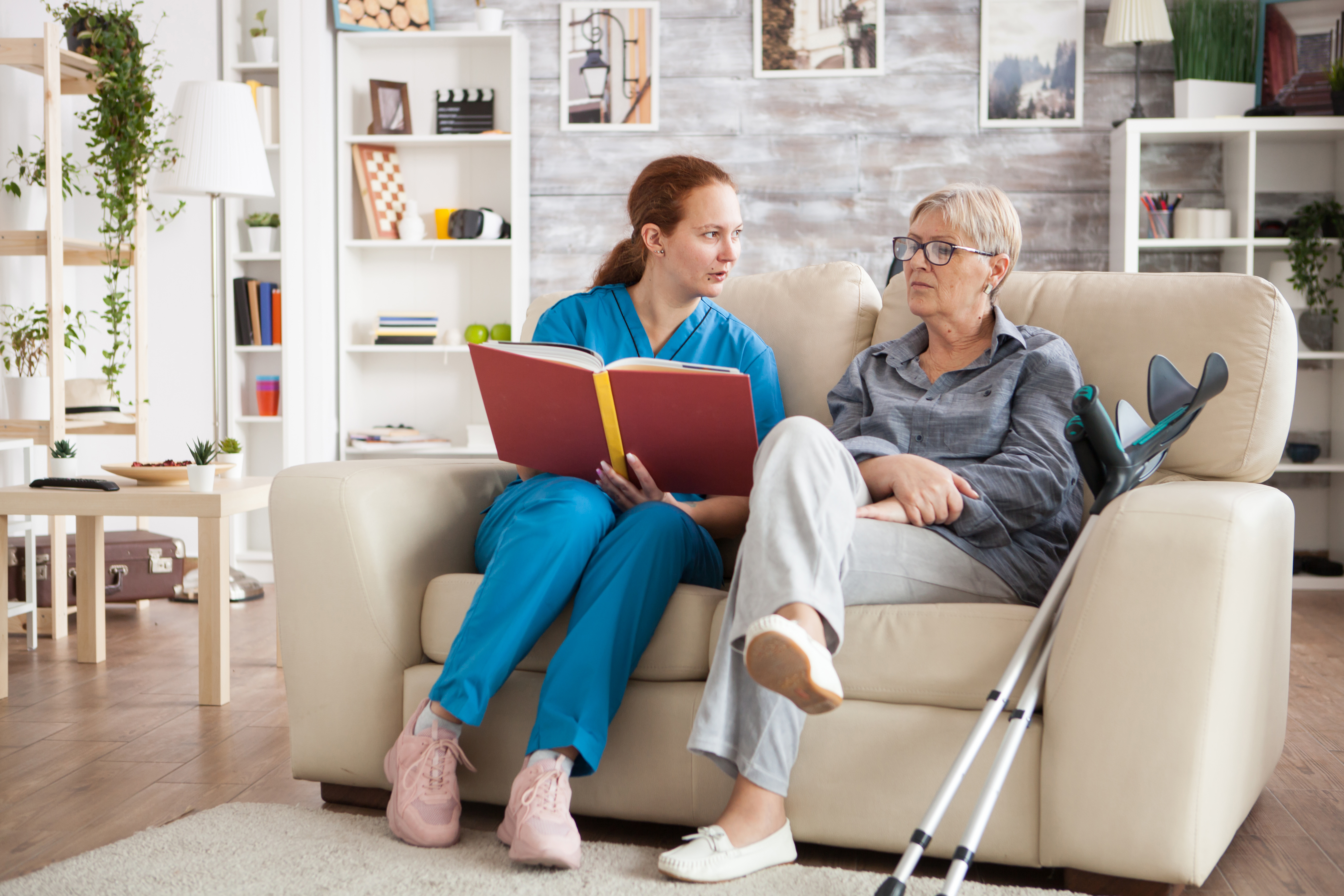 A Comfort Keepers caregiver sharing a warm moment with a senior client at home in Burlington County, NJ