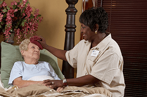 Caregiver Providing Palliative Care at Home