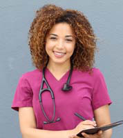 Caregiver in scrubs with clipboard