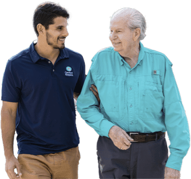 Caregiver steading client while out for a walk
