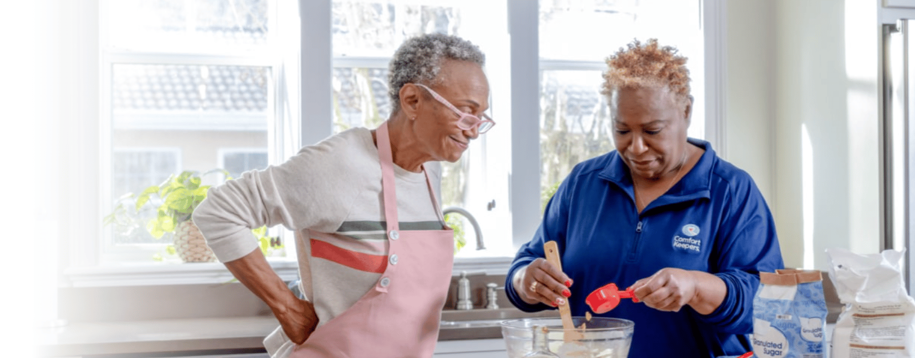Comfort Keepers Caregiver Cooking with Client